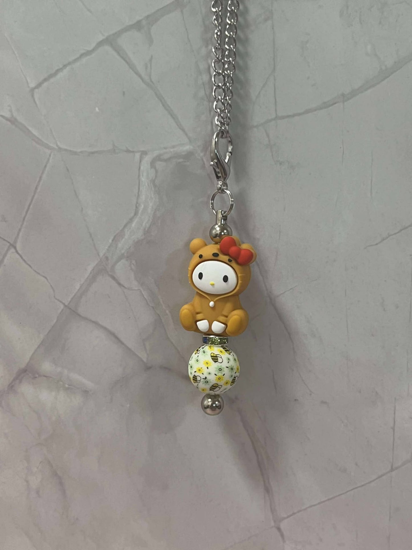 Hello Kitty dressed as a Bear drink bottle chain