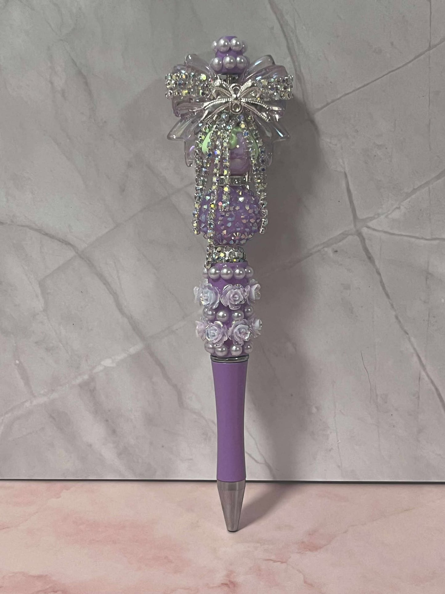 Purple bow bedazzled pen