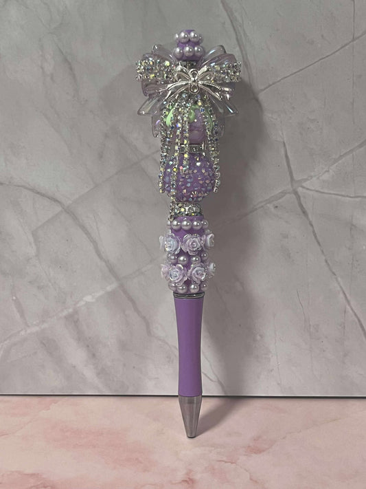 Purple bow bedazzled pen